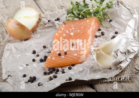 lightly smoked irish salmon fillet with salt and pepper Stock Photo