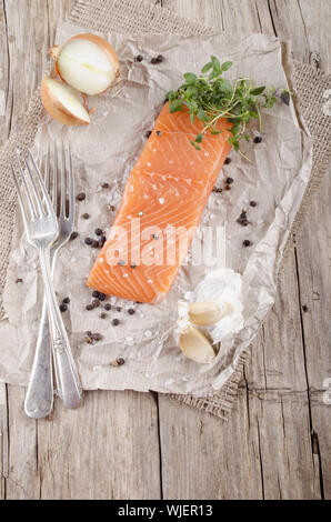 lightly smoked irish salmon fillet with salt and pepper Stock Photo