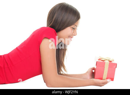 Woman holding gift isolated Stock Photo