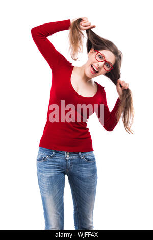 Beautiful woman making a funny face and grabbing her own hair, isolated over white background Stock Photo