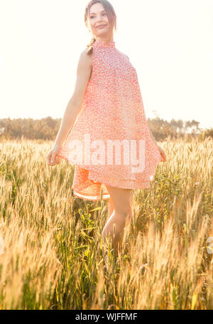 Preety woman on a meadow Stock Photo