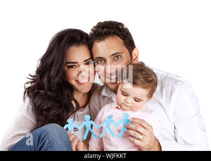Young arabic family isolated on white background, holding in hands bonding paper people figure, safety and security, human reproduction concept Stock Photo