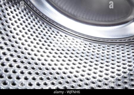 washing machine drum background with copyspace showing household concept Stock Photo