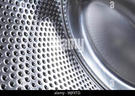 washing machine drum background with copyspace showing household concept Stock Photo