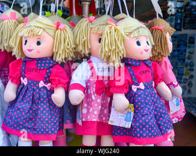 ISLE OF CAPRI, ITALY - AUGUST 2019: Souvenir soft dolls on display outside a shop on the Isle of Capri. Stock Photo