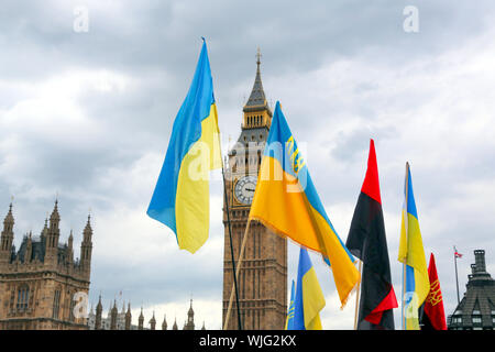 London, Great Britain -May 22, 2016: national flags of Ukraine on the background of Big Ben on the Westminster Bridge Stock Photo