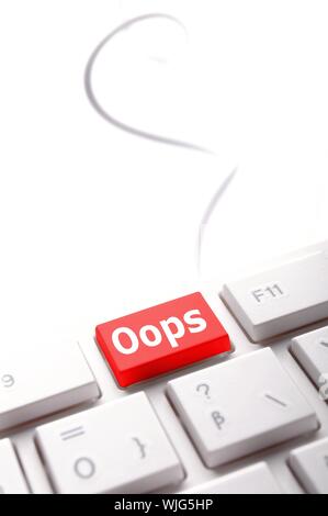oops key on computer keyboard showing mistake concept Stock Photo