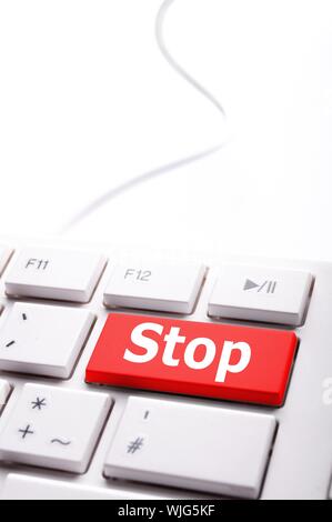 stop key on keyboard in red showing halt concept Stock Photo