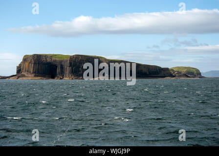 The Remote and Uninhabited Scottish Island of Staffa Off The Isle of Mull Scotland United Kingdom landscape seascape six 6 sided hexagonal basalt rock Stock Photo