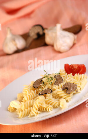 organic summer truffle with pasta butter and tomato Stock Photo