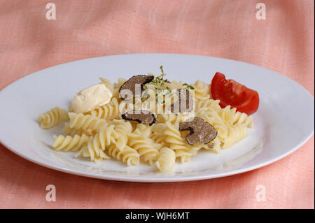 organic summer truffle with pasta butter and tomato Stock Photo