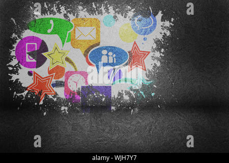 Splash on wall revealing applications Stock Photo