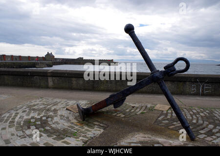 Old rusty anchor at the harbour in Saltcoats, South Ayrshire in Scotland Stock Photo