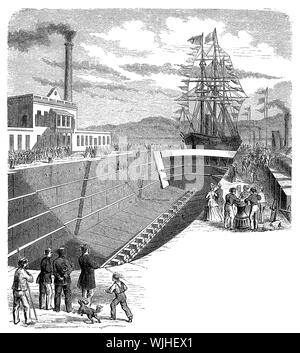 Launch of a sailboat at the dry dock in Suez used for ship repair and shipbuilding Stock Photo