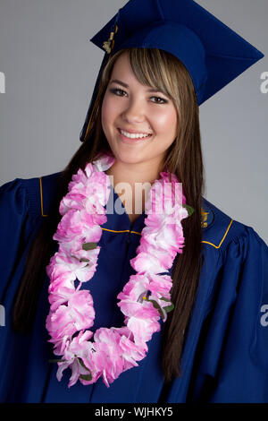 Graduation girl wearing flower lei Stock Photo