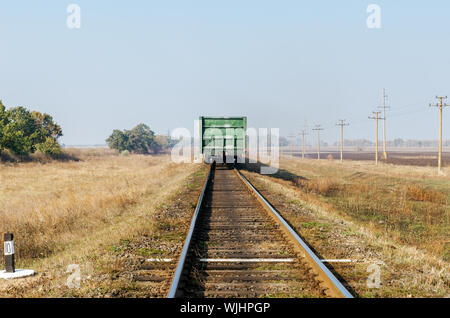 last wagon on old railroad Stock Photo