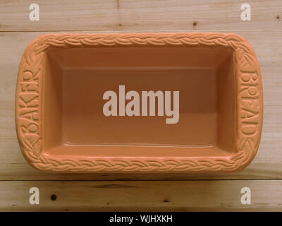 close up of a clay bread baking pan Stock Photo