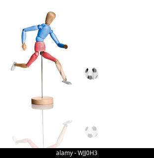 Colored wood toy playing football - isolated on white with reflection Stock Photo