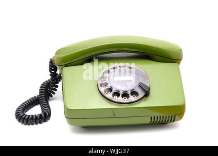 Old analogue disk phone on a white background Stock Photo
