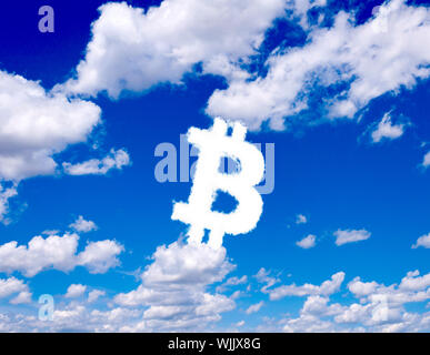 Bitcoin sign in clouds form with blue sky background Stock Photo
