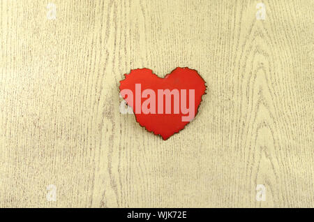 red heart on wood background Stock Photo