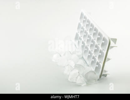Ice cubes removed from the ice cube. White Background Stock Photo