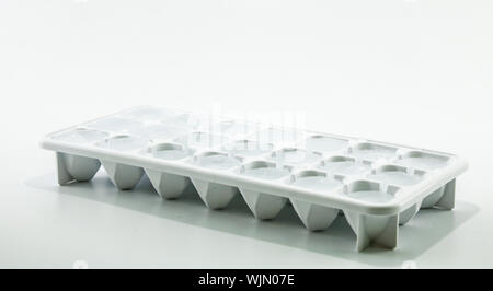 Ice cube removed from the refrigerator. Black Background Stock Photo