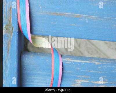 Close-up Of Ribbon On Wood