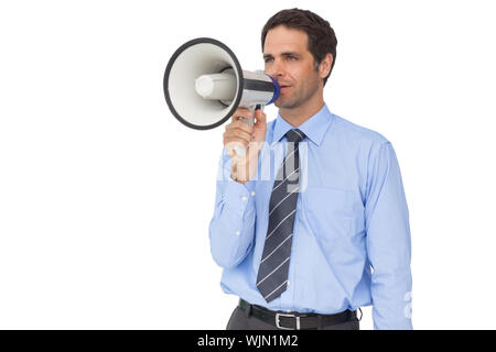 Handsome businessman talking through megaphone on white background Stock Photo