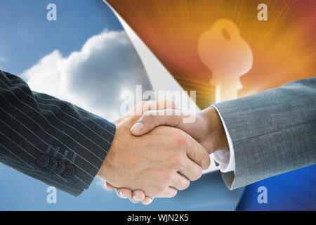 Composite image of business handshake against shiny copyright icon on black background Stock Photo