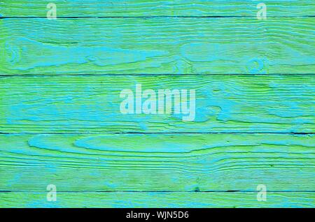 Wooden background texture. Creatively painted green and blue boards. Stock Photo