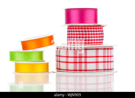 Many bright ribbons isolated on white Stock Photo