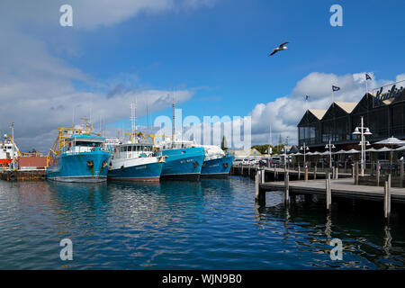 Fremantle, Western Australia - Aug 6th 2019: Fishing boats at the harbour and water front. A famous landmark for tourists. Stock Photo