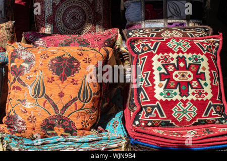 Different kinds of traditional pillows and patterns on it. Stock Photo
