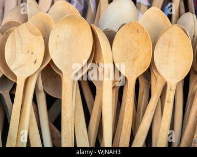 Wooden spoons. Close-up. Close-up in light brown color. Stock Photo