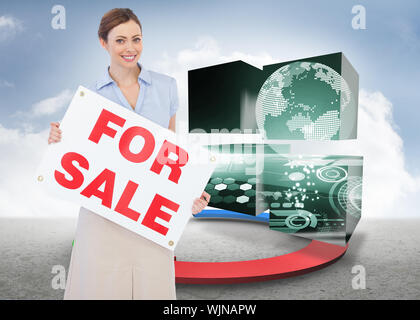 Estate agent posing with for sale sign against blue red and green arrows in desert landscape Stock Photo