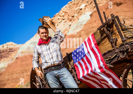 SOUTh WEST - A cowboy takes time to rest and reflect. Stock Photo