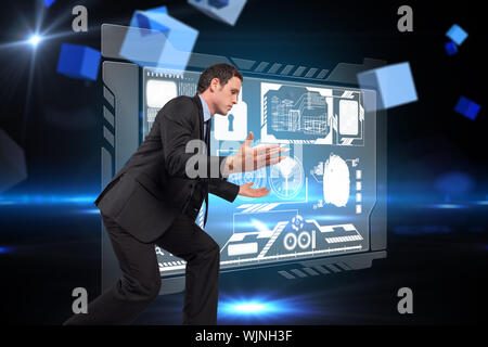 Businessman posing with arms outstretched against boxes on technical background Stock Photo