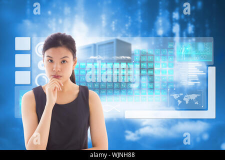 Thoughtful asian businesswoman against cityscape on cloud Stock Photo