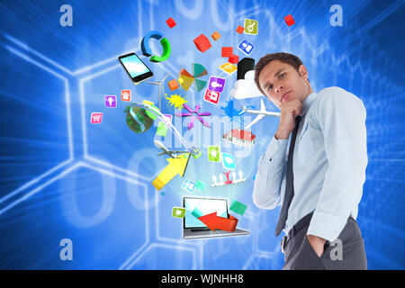 Thoughtful businessman with hand on chin against background with shiny hexagons Stock Photo