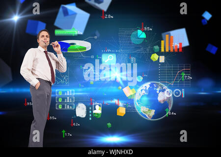 Thinking businessman holding glasses against boxes on technical background Stock Photo