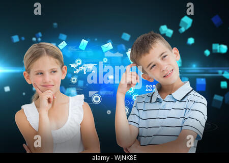 Pensive brother and sister posing together against futuristic screen with quaders Stock Photo