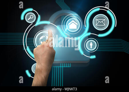 Hand pointing against shiny lock on black background Stock Photo
