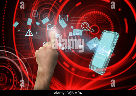 Hand pointing against shiny red circles on black background Stock Photo