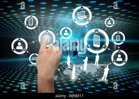 Hand pointing against keyhole on technological glowing background Stock Photo