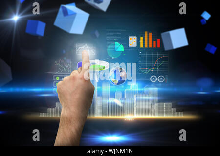 Hand pointing against boxes on technical background Stock Photo