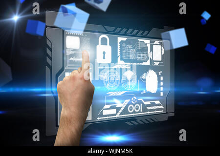 Hand pointing against boxes on technical background Stock Photo