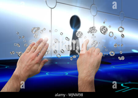 Hands pointing and presenting against keyhole on technological background Stock Photo