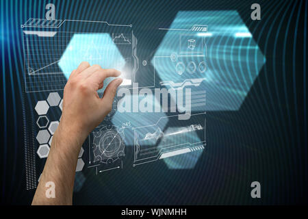 Hand presenting against shiny hexagons on black background Stock Photo
