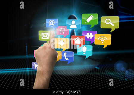 Hand pointing against keyhole on technological background Stock Photo